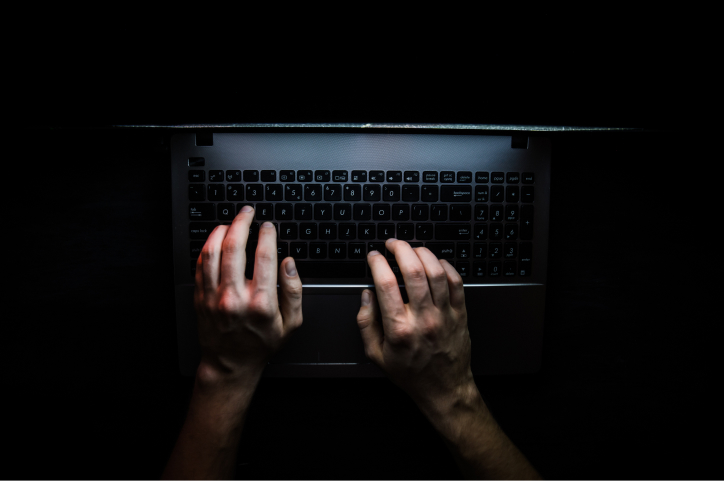 hacker hacking the server in the dark web